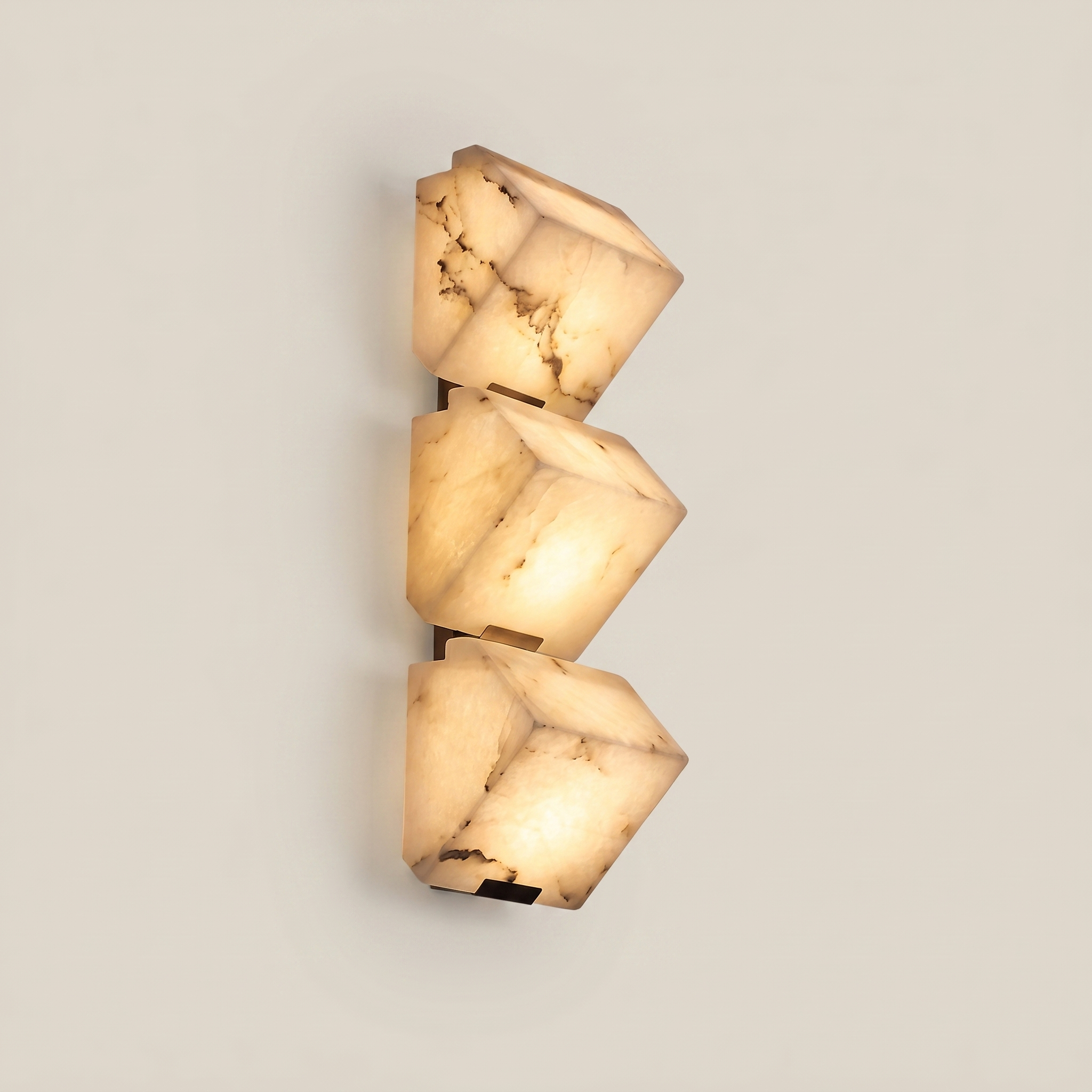 Close-up unlit black faux marble resin single-head LED wall sconce showing detailed faux marble texture and black iron body