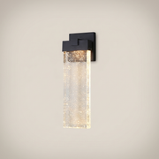 Black matte die-cast aluminum crystal COB LED outdoor wall sconce shown front view with crystal shade and warm white light