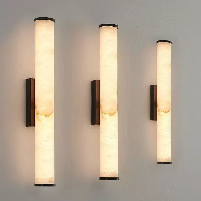 Close-up of Cloud Stone Resin Cylindrical Matte Black 14W LED wall sconce showing detailed cloud stone texture and matte black finish