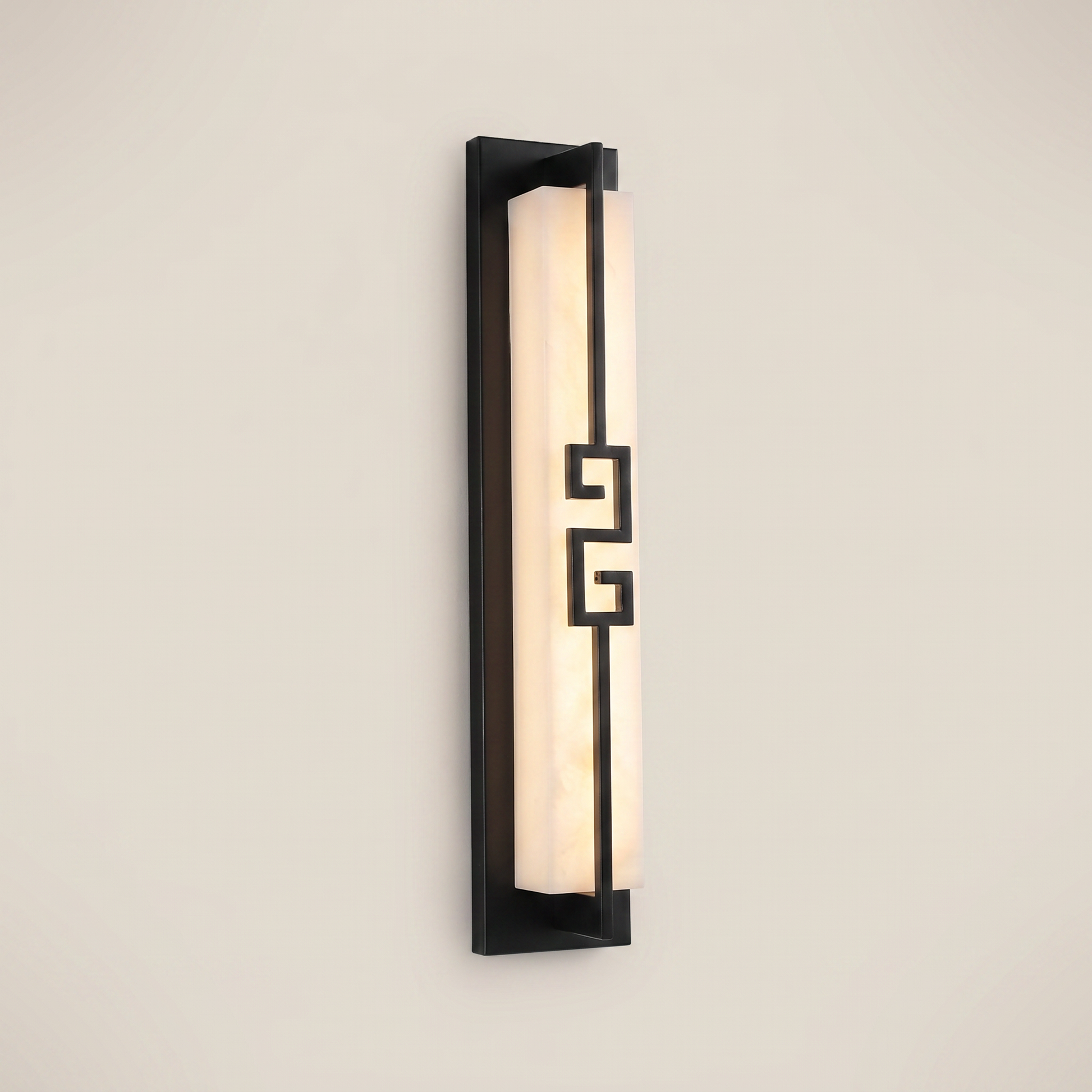 Close-up of elongated black outdoor water-resistant wall sconce Minglan 4.7 inch wide by 31.5 inch tall lit showing sleek minimalist design