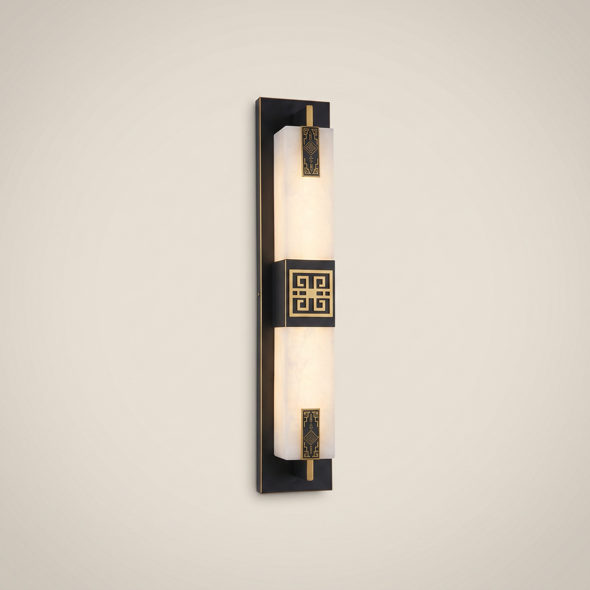 Eye-level wide shot of elongated black outdoor water-resistant wall sconce Shuya 4.7 inch by 23.5 inch lit warmly