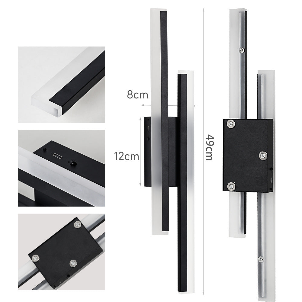 Black fabric acrylic dual vertical LED USB-C rechargeable no-drill wall sconce top-down lit showing fabric lamp body detail