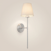 Gold fabric wireless RGB remote control 1-light wall sconce front view with fabric shade lit in living room