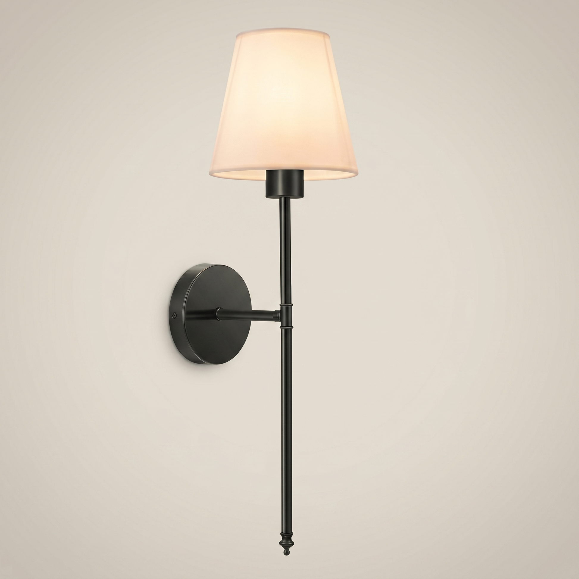 Silver fabric wireless RGB remote control 1-light wall sconce at three-quarter angle lit on bedroom wall with fabric shade