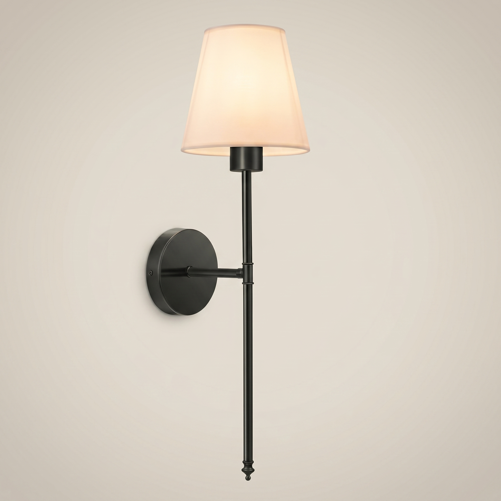 Silver fabric wireless RGB remote control 1-light wall sconce at three-quarter angle lit on bedroom wall with fabric shade