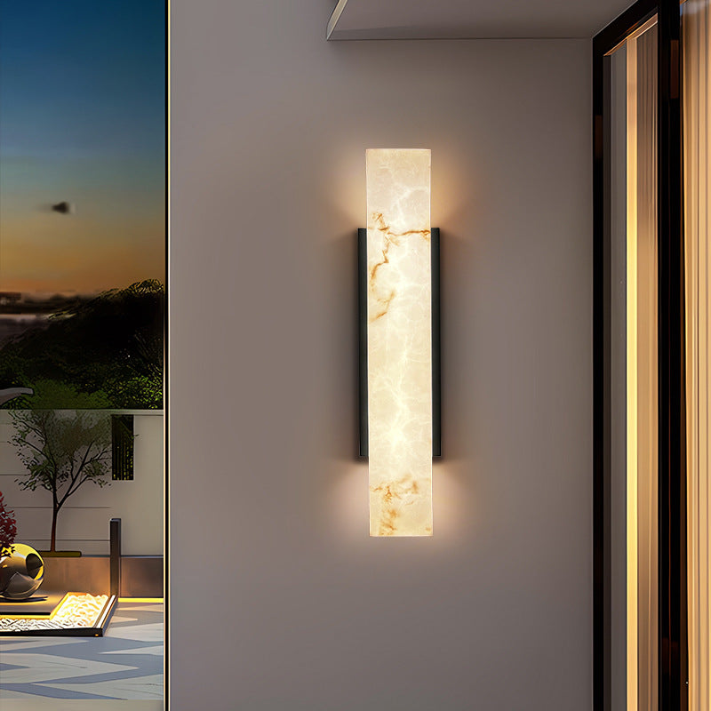 Side profile of imitation cloud stone rectangular waterproof LED outdoor wall sconce variant 5.1 inch wide by 23.6 inch high with black metal bracket