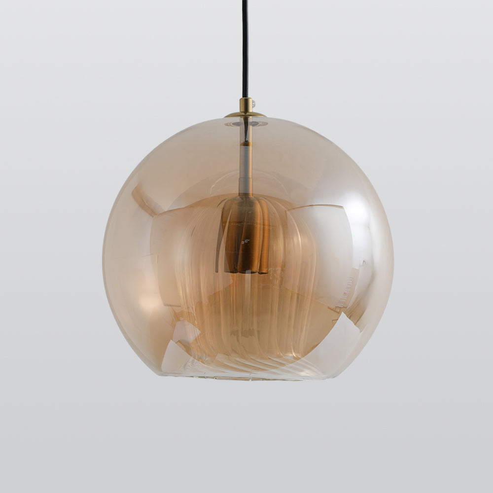 Full view of the Lustre Aura LED pendant light featuring an amber spherical glass shade with a ribbed inner glass, hanging against a light background.