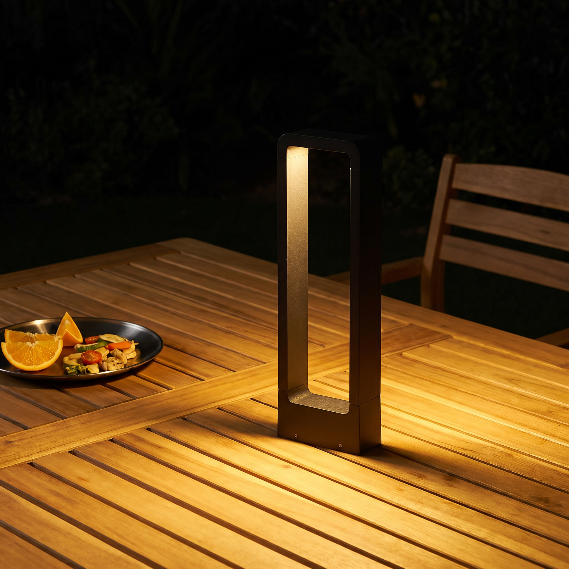 Close-up detail of matte black aluminum rectangular IP65 10W LED outdoor lawn light base mount 23.6 inch height showing powder coated finish