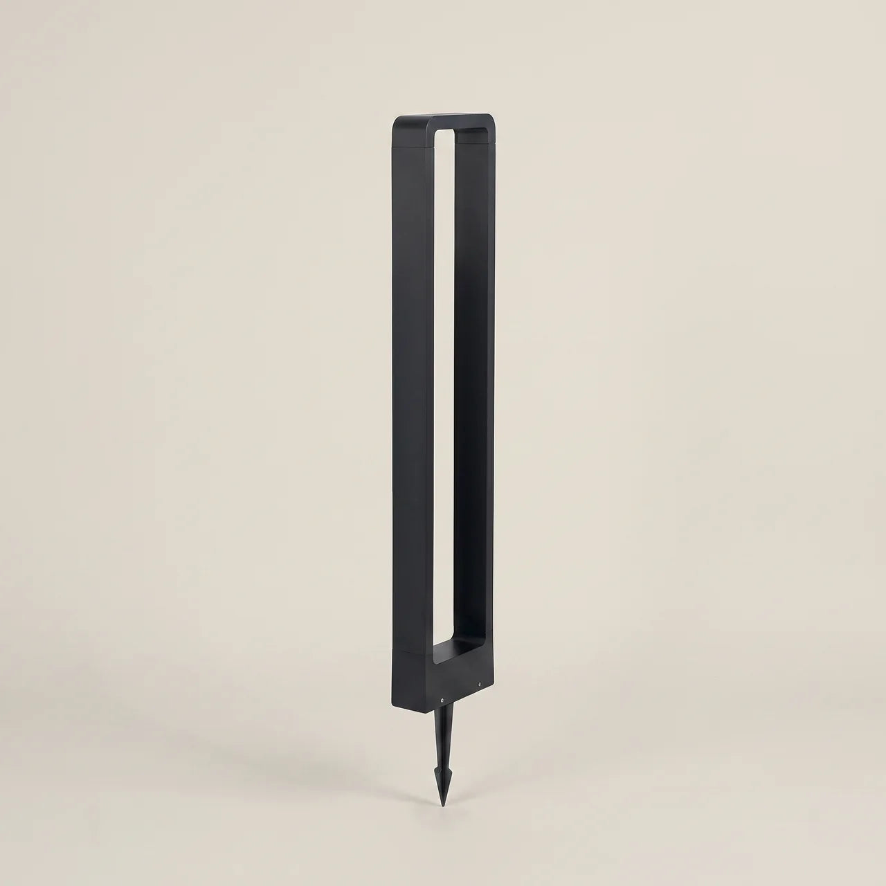 Close-up detail of matte black aluminum rectangular IP65 10W LED outdoor lawn light spike mount 11.8 inch height showing waterproof label visible