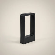 Matte black aluminum rectangular IP65 10W LED outdoor lawn light shown front view base mount 11.8 inch height with matte black finish