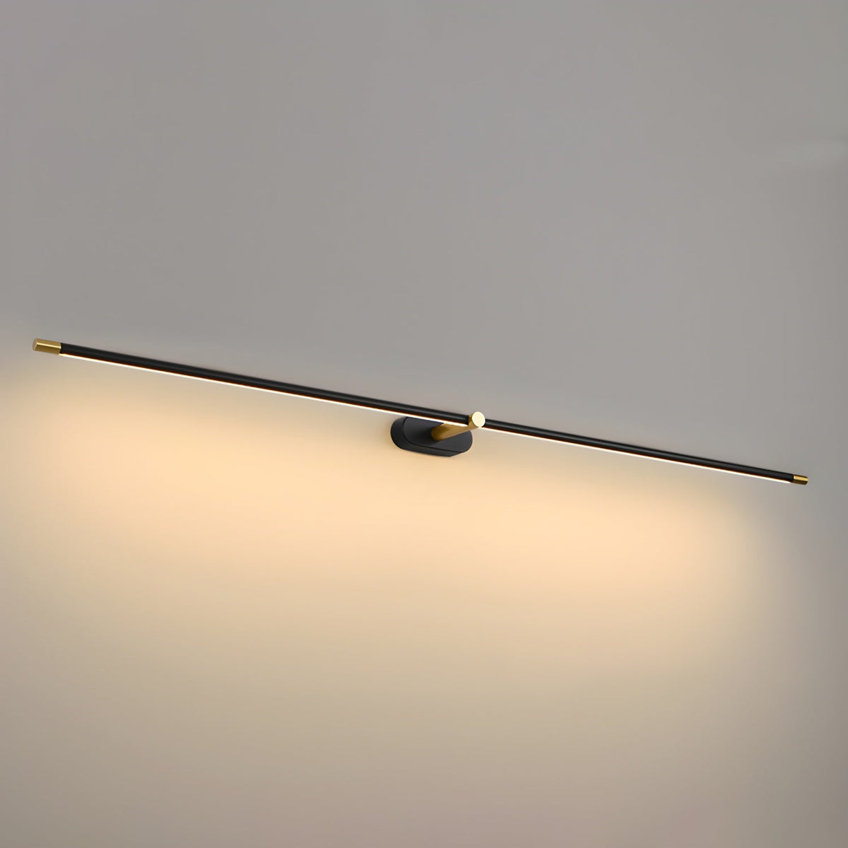 Vestra Minimalist Linear Rechargeable Wall Lamp in black finish, lit with a warm glow, mounted on a grey wall.