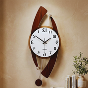 Modern Retro Wall Clock for Living Room with wooden design on a beige wall.