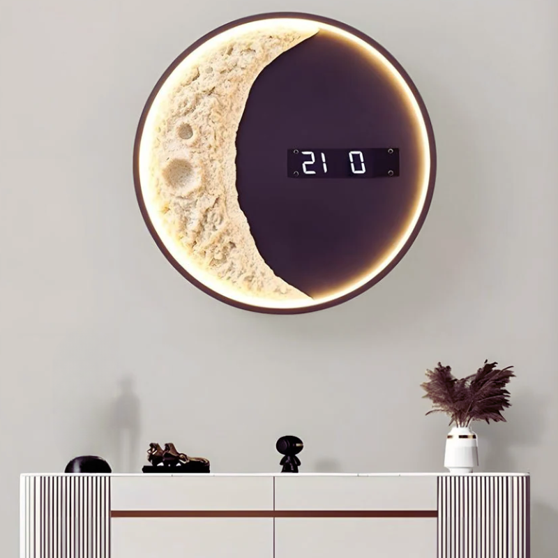 Moon LED Wall Light with Digital Wall ClockMoon-shape on a light gray wall above a console table.