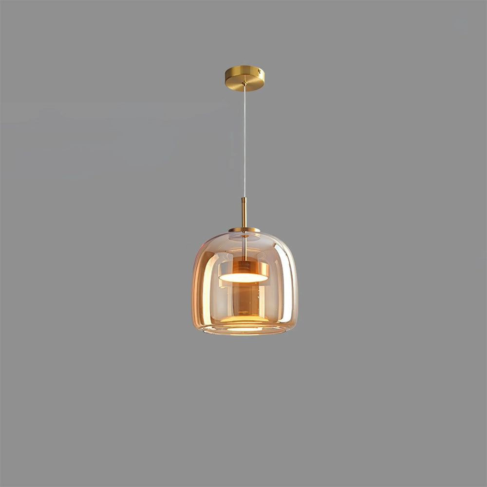 A single Nordic Glow smoked glass LED pendant light in amber, illuminated and hanging against a plain grey background, showcasing its minimalist design and warm glow.