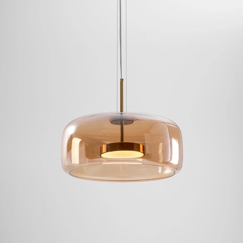 Nordic Glow Smoked Glass LED Pendant Light, type B, amber color, illuminated with warm light against a plain background. Modern minimalist design.