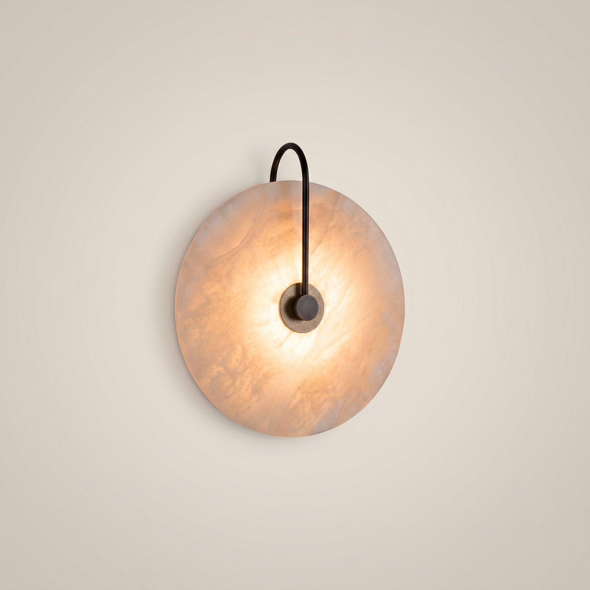 Natural marble black round warm LED wall sconce shown front view with 20cm diameter and warm light glowing