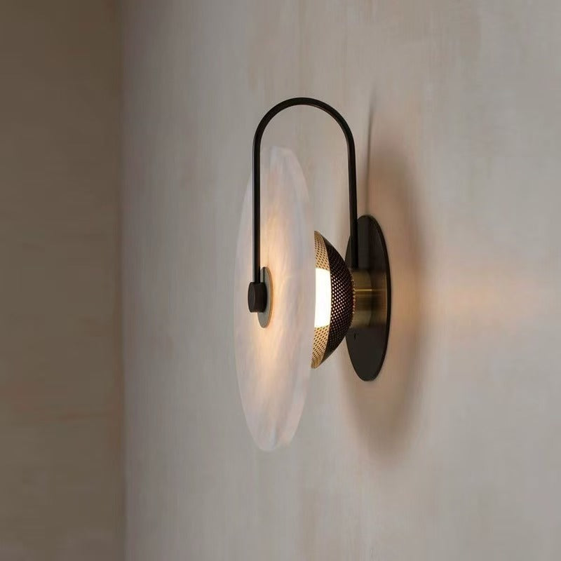 Faux marble black round warm LED wall sconce side profile with 25cm diameter and warm light glowing