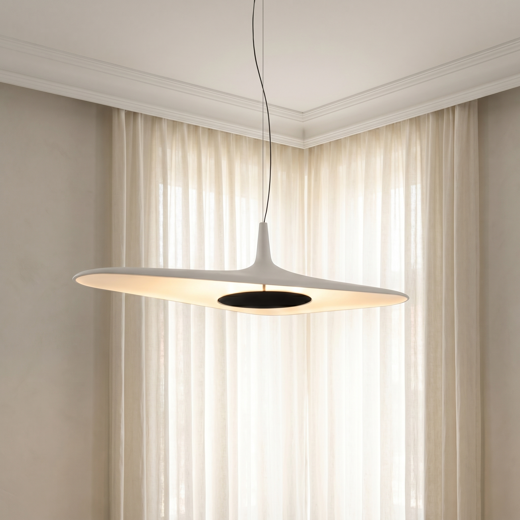 Nordic Art Pendant Light in white shown eye-level wide shot in living room with postmodern minimalist style