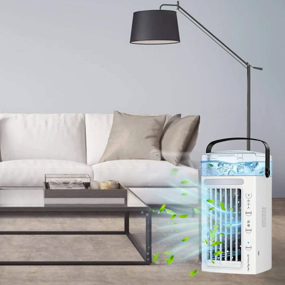 BreezeCraft Portable Air Conditioner Mini Cooler in a modern living room setting, positioned on a wooden floor in front of a white sofa and coffee table. The device projects a blue light and green leaves, illustrating its cooling effect. Perfect for home office cooling or personal comfort.