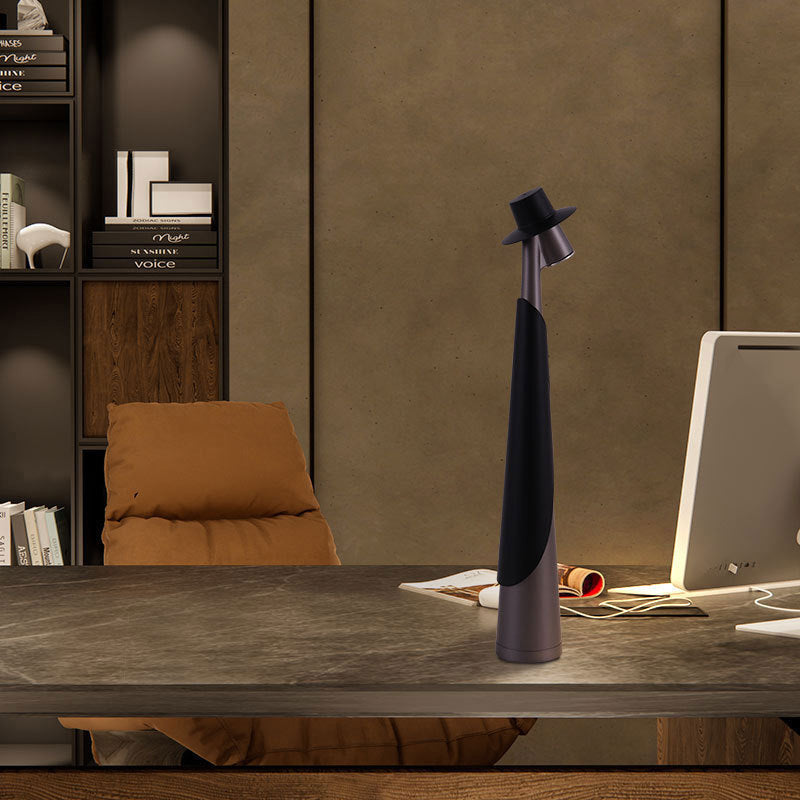Gray Plastic Tall Rechargeable LED Ambient Portable Table Lamp three-quarter angle lit on living room console