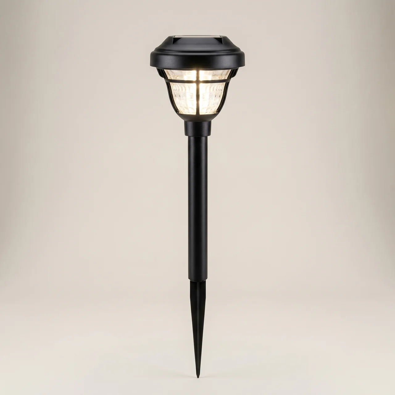 Ambient room three-quarter view of PP Round Solar Light Sensor with nickel-metal hydride battery glowing warm light with shadow projection effect