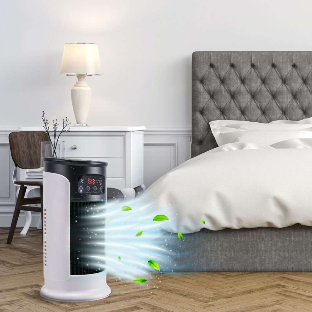 Serenity Breeze portable air conditioner unit in a bedroom, blowing cool air with green leaves, highlighting its use for comfortable sleep.