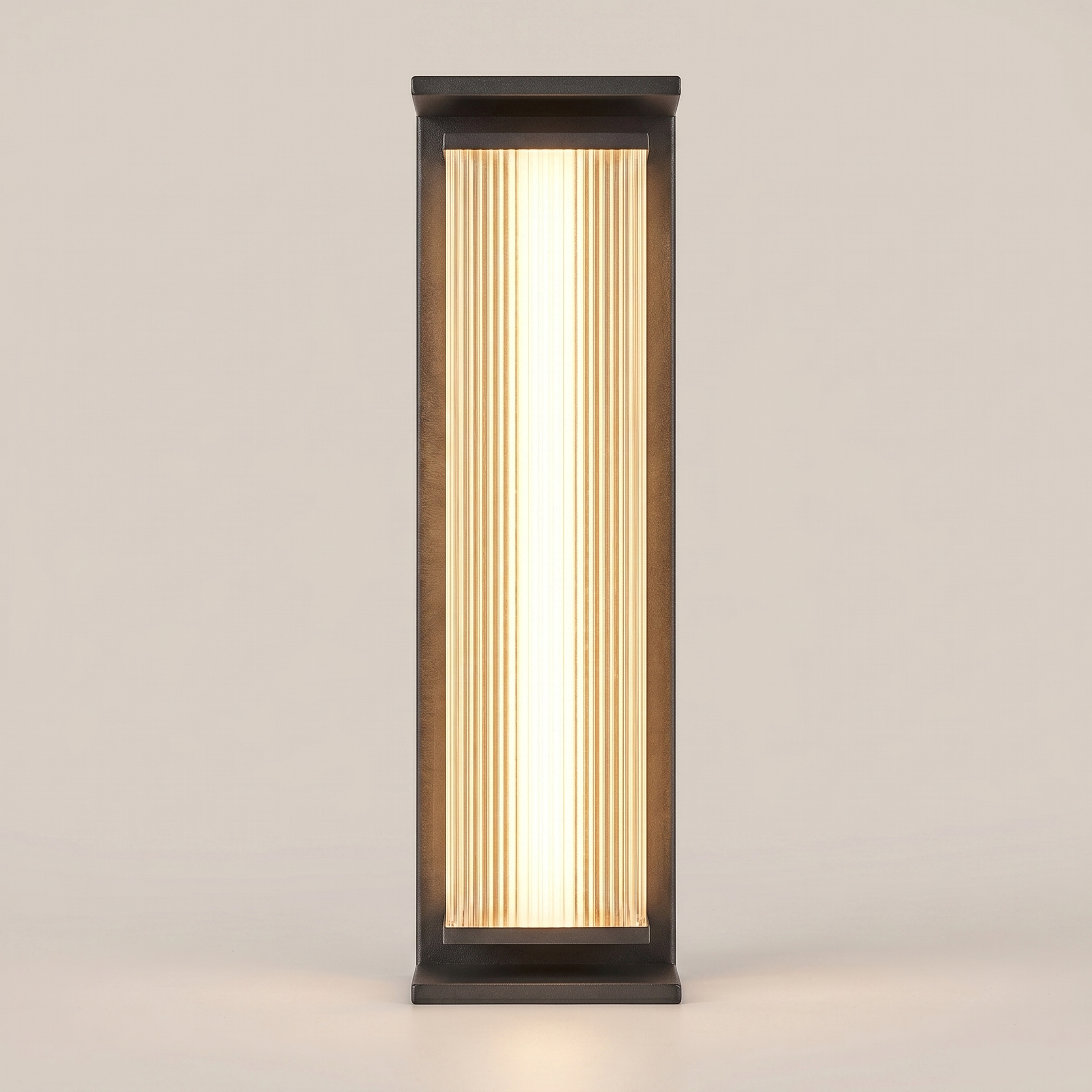 Close-up front detail of stainless steel vertical ribbed waterproof LED outdoor wall sconce in flash silver black showing ribbed pattern