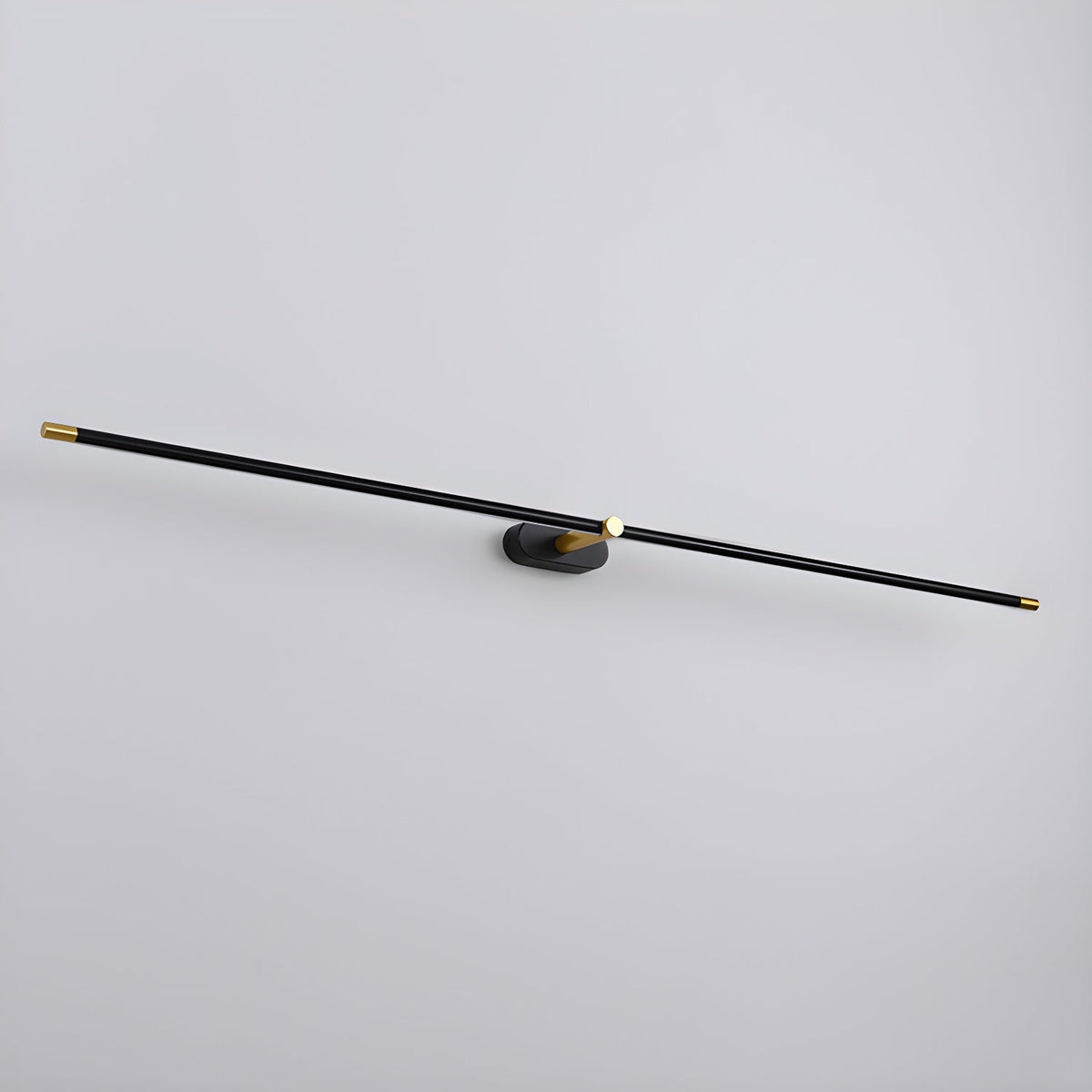 Close-up view of the Vestra Minimalist Linear Rechargeable Wall Lamp in black finish with gold accents, mounted on a plain white wall.
