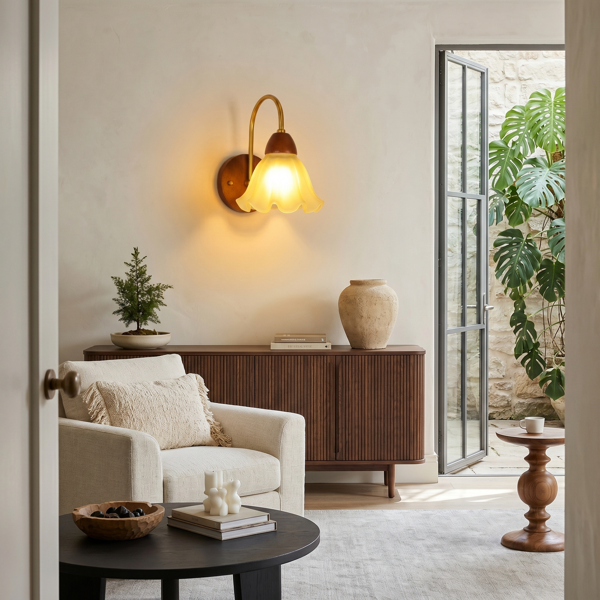 Walnut wood single-head mid-century wall sconce shown eye-level wide view with walnut finish beside bedroom bed