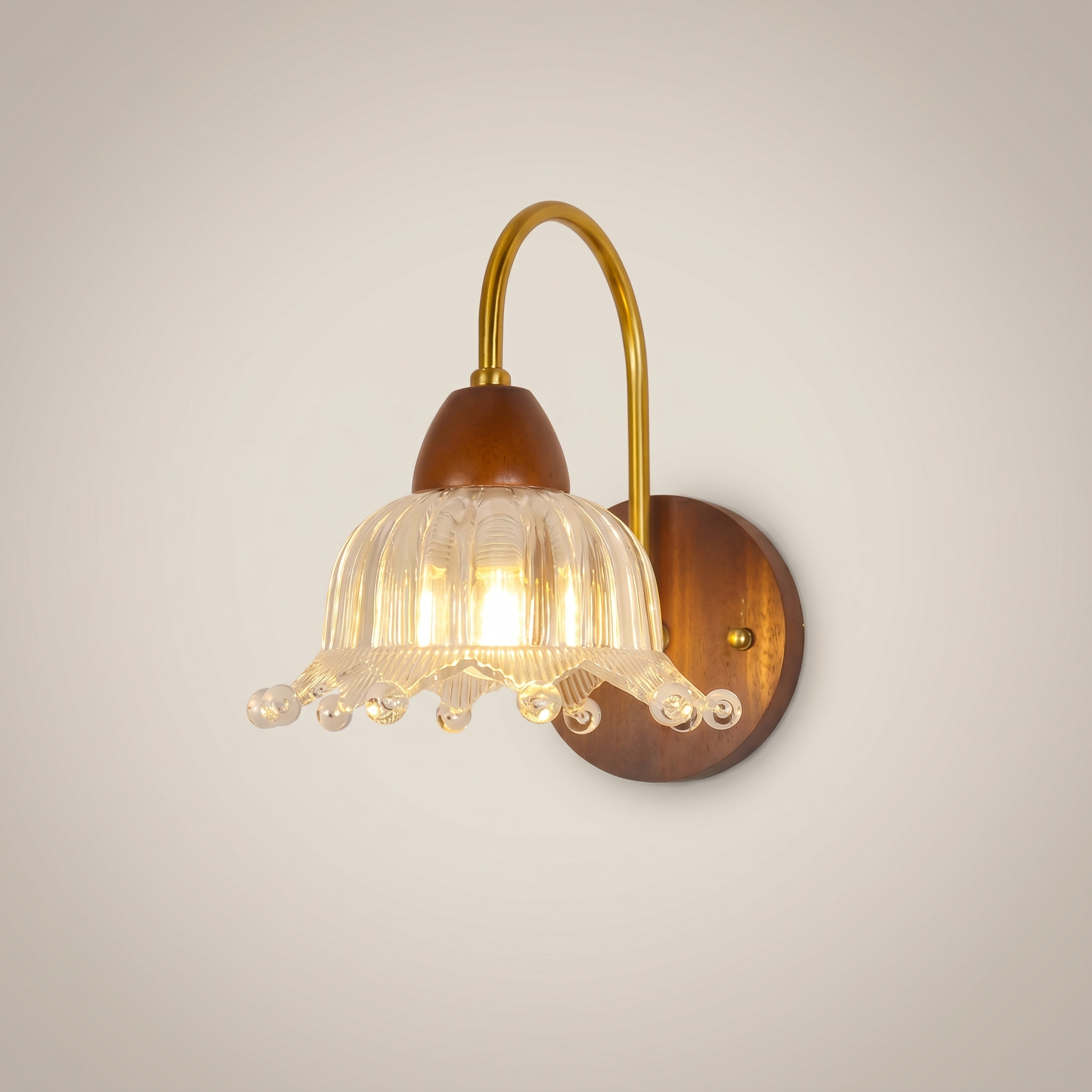 Three-quarter view of walnut wood single-head mid-century wall sconce with walnut finish mounted on bedroom wall
