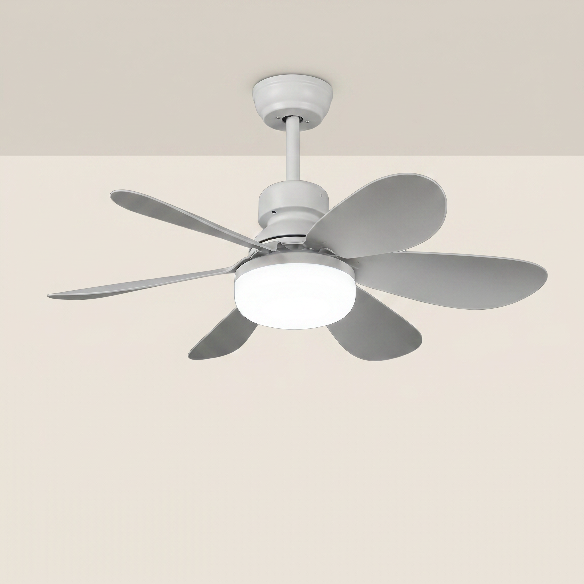 White plastic round DC brushless motor ceiling fan light shown at three-quarter angle with white blades lit on a kitchen ceiling