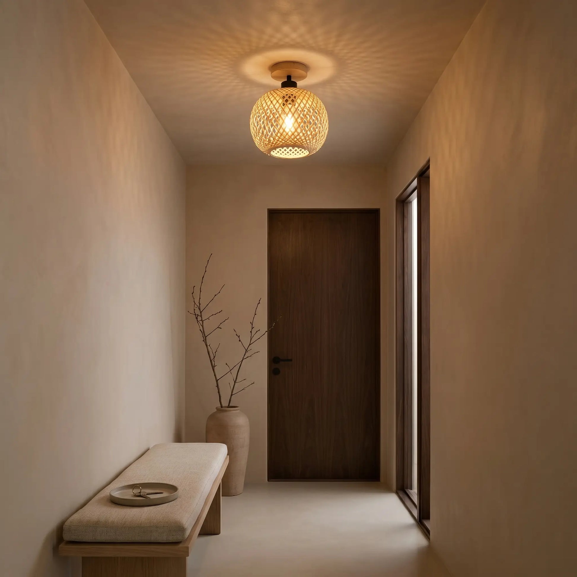 Pastoral bamboo wood spherical incandescent ceiling light at three-quarter angle with warm light in japandi entryway flush mount style