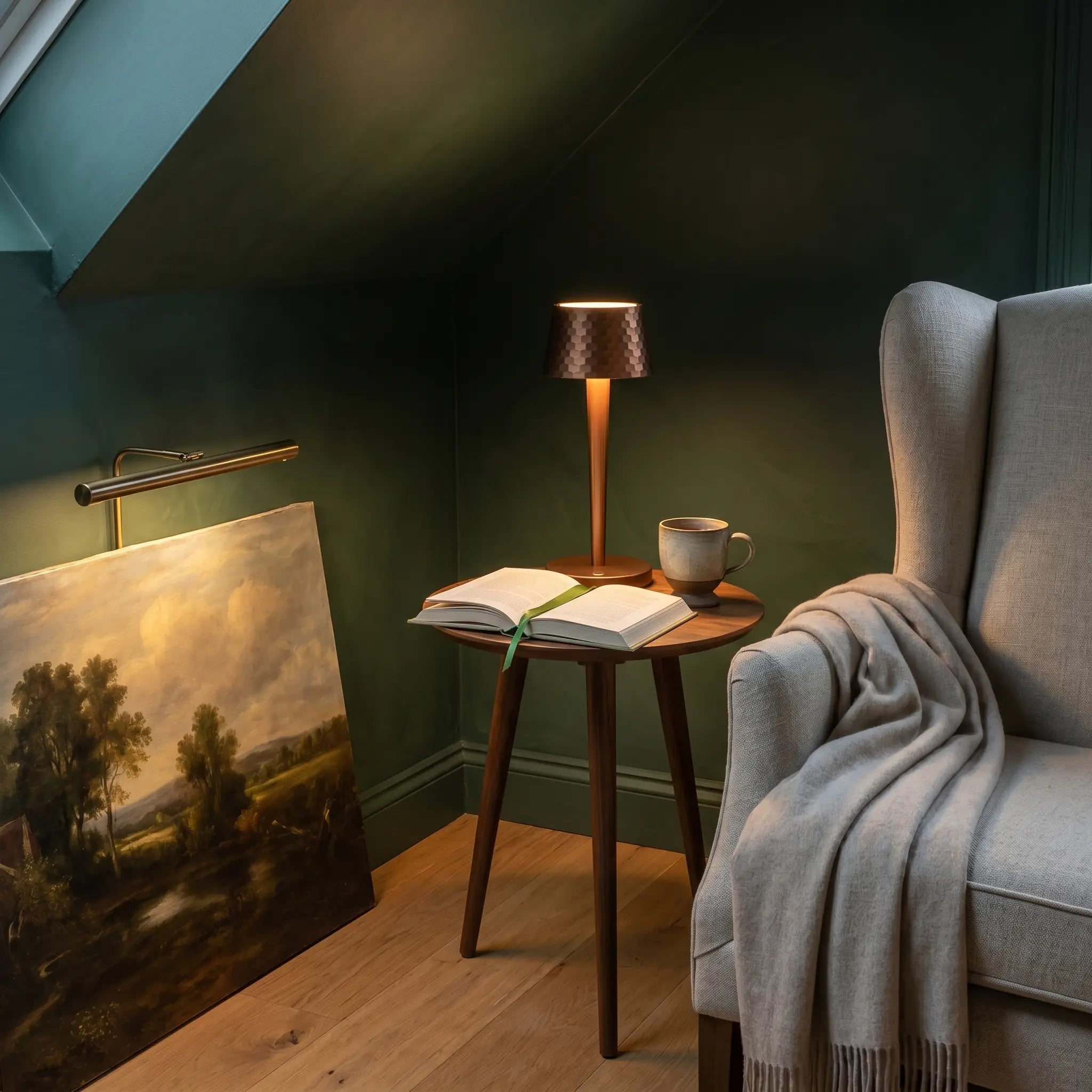 Aluminum touch dimmable USB rechargeable LED bedside lamp side profile in brushed aluminum lit in forest green reading nook