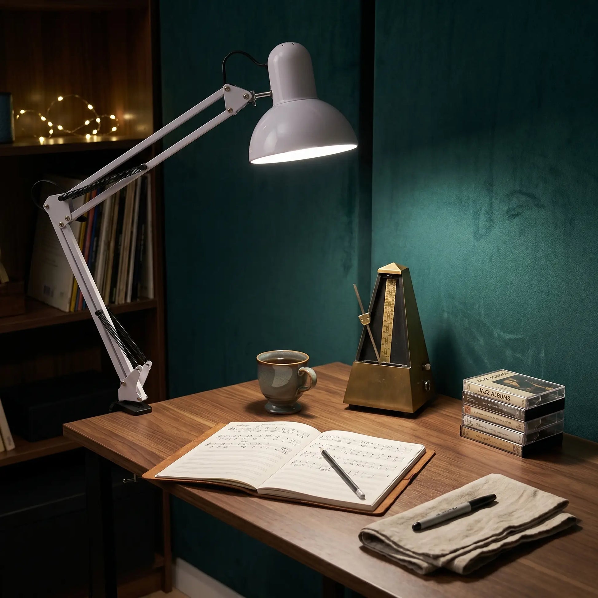Lifestyle scene — Black Adjustable Long Arm Tri-Color 12W Clip-On Table Lamp