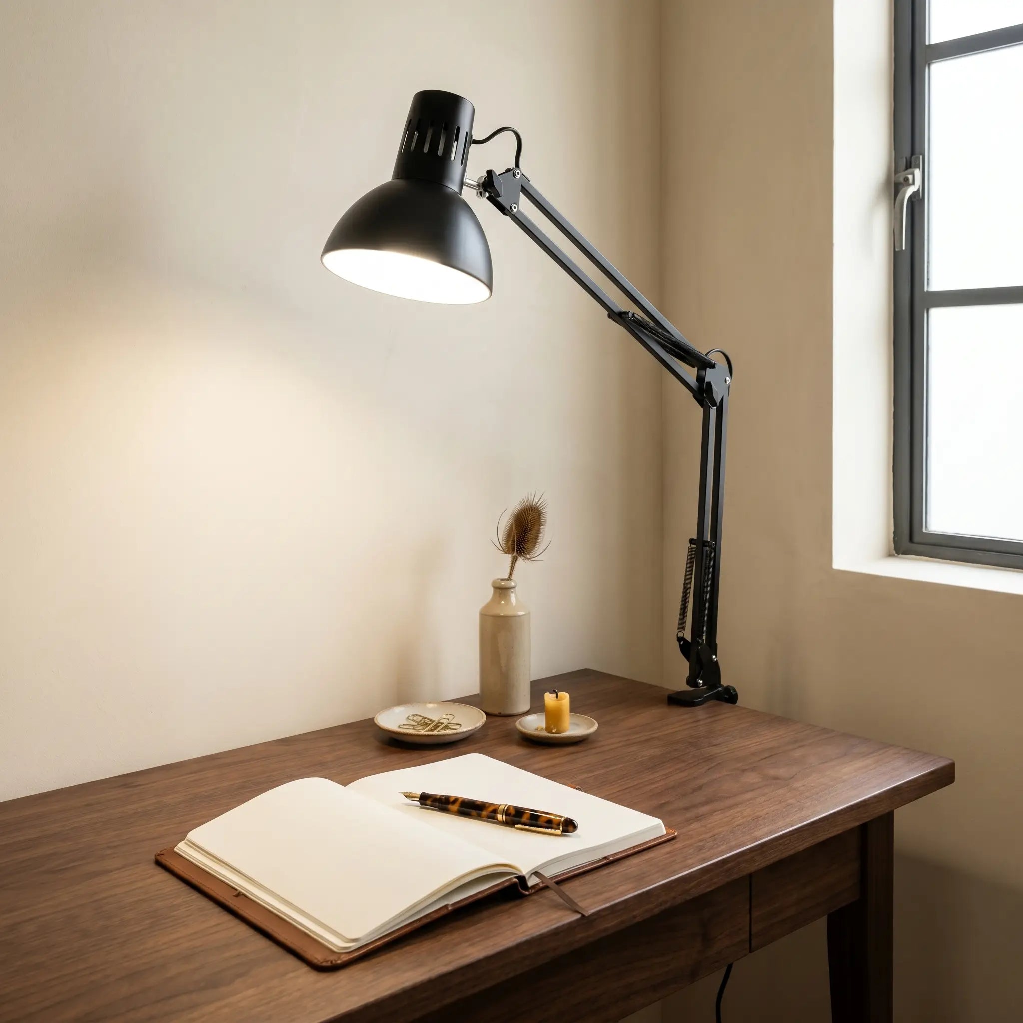 Lifestyle scene — Black Adjustable Long Arm Tri-Color 12W Clip-On Table Lamp