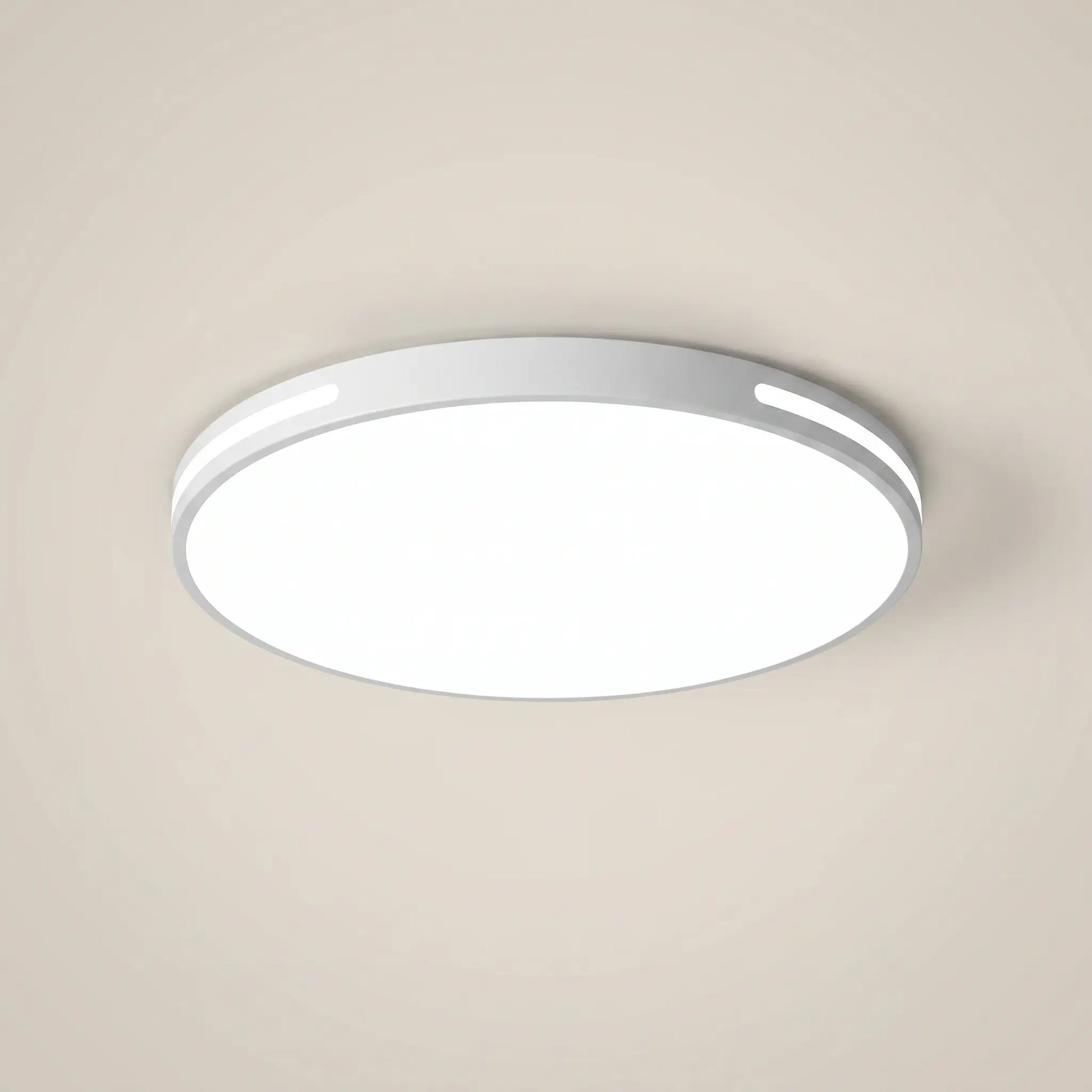 Minimalist modern white PVC iron voice control LED ceiling light round 12 inch shown front view with white PVC shade and iron body